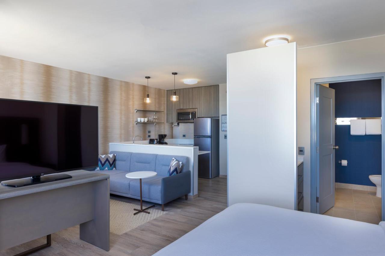 Studio with Two Queen Beds with Balcony and Garden View